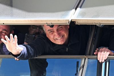 Bolsonaro returns to Brazil, vowing Lula's days are numbered