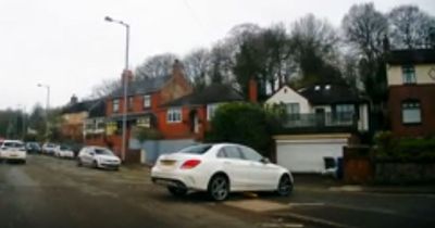 Mercedes driver stuck in middle of road after hitting bollard in 'slowest crash ever'