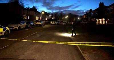Road closed and cars damaged as police carry out search