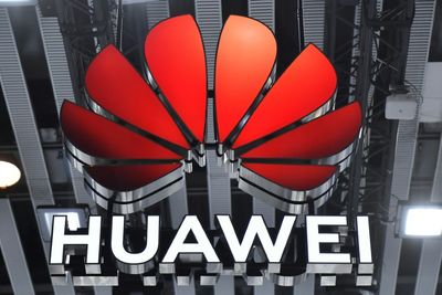 Huawei reports huge drop in profits as US sanctions bite