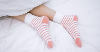 Grim reason you should never wear socks to bed according to sleep expert