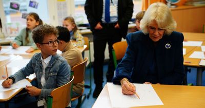 Queen Camilla impresses school kids as she shows off little-known artistic talent