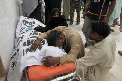 Stampede at food distribution center kills 11 in Pakistan