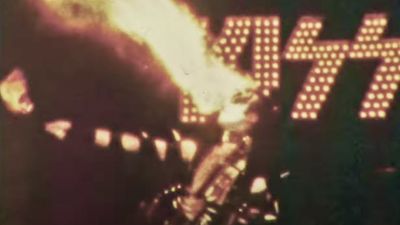 Watch the moment Kiss’ Gene Simmons set his hair on fire during a 1973 show