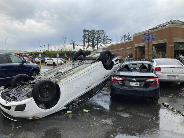 A tornado slams Little Rock, smashing rooftops and flipping vehicles