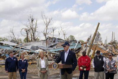 Biden tours Mississippi tornado wreckage as more storms threaten US