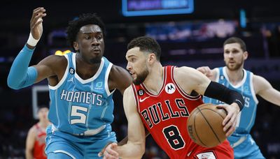 Bulls throttle Hornets, get some help in play-in standings