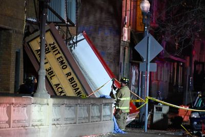 One dead, dozens injured in theatre roof collapse as tornado rips through Illinois