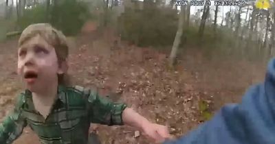 Watch heart-wrenching moment police find boy, 4, missing in woods from his crying