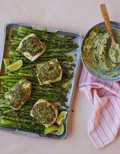 Thomasina Miers’ recipe for roast hake and asparagus with grilled spring-onion butter