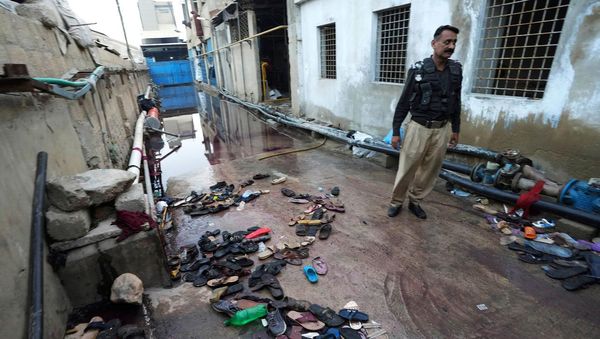 Pakistani police arrest eight after 12 killed in Ramadan food stampede