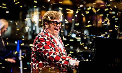 Elton John review – cheers, tears and a stairlift to heaven
