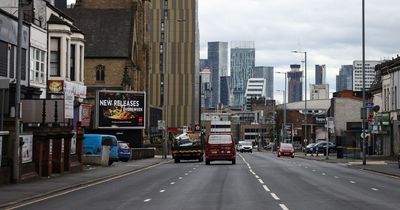 Woman cut from car following crash on major road