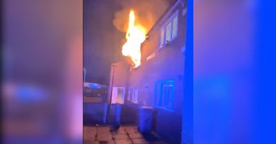 Man lay visibly 'smouldering' in garden after jumping from burning building