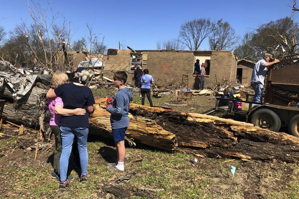 At least 18 dead after tornadoes rake Midwest, South