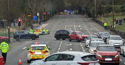 Two men taken to hospital after crash on major road in Bolton