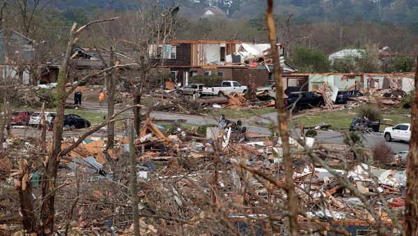 ‘Chaos, absolute chaos’ – at least 18 dead and dozens injured after tornadoes rip into US south and mid-west