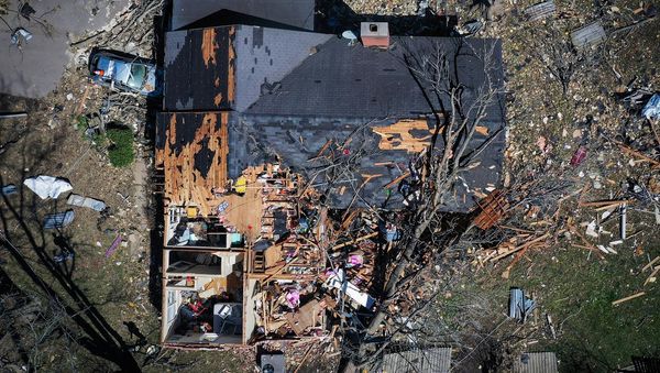 At least 26 dead after tornadoes tear path through US South and Midwest