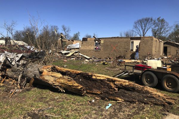 At least 26 dead after tornadoes rake Midwest, South