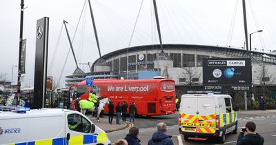 Police investigate attack on Liverpool team bus as FA condemn Man City fans chant