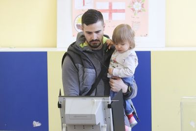 Bulgaria conservatives and liberals in a close race as votes counted
