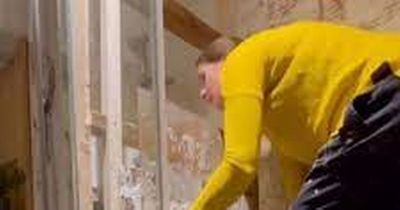 Startled woman finds 'secret shower' with tiles and mirror while decorating home