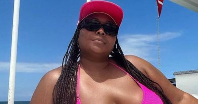 Lizzo wows fans as she flaunts her curves in a tiny bikini while relaxing on a yacht