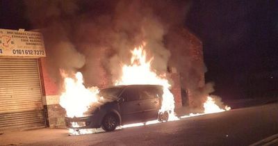 Dramatic scenes as fire rips through vehicle before spreading to nearby garage