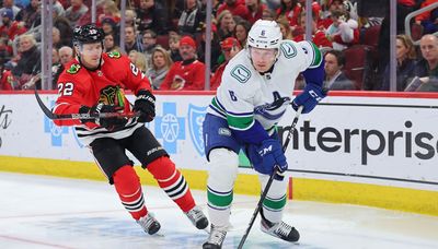 Blackhawks juggling overcrowded defensive corps as they begin final road trip
