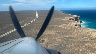 Flying doctors touch down on Eyre Highway after driver critically injured by car rollover