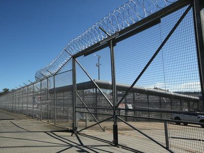 Woman left in 'urine-soaked clothes' in prison van