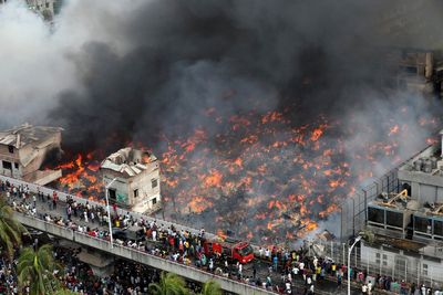 Fire races through clothing market in Bangladesh capital