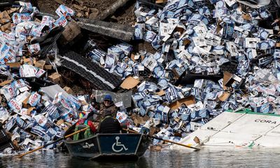 Spilled drink: train derails beside Montana river, tipping out cases of beer