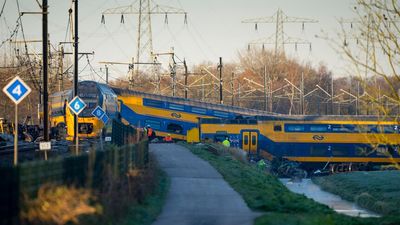 Two trains collide with construction crane causing derailment near The Hague, leaving one dead, several injured