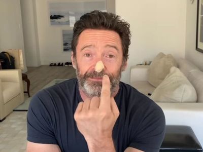 Hugh Jackman urges fans to wear sun cream as he awaits skin cancer biopsies