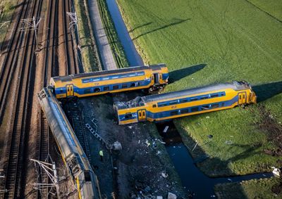 One dead after Dutch train hits crane