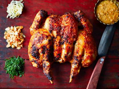 Bored of lamb? Cook this satay roast chicken for a perfect Easter feast