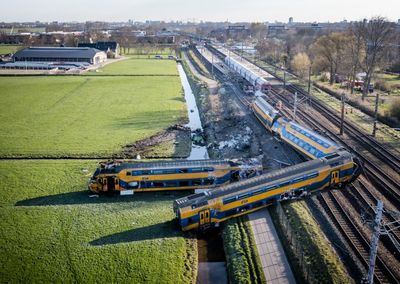 One dead, many hurt as Dutch train hits crane