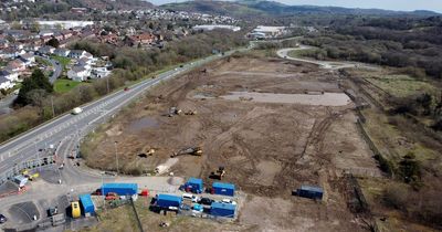 Work starts on 'town centre' site that's stood empty for years with its own roundabout to nowhere