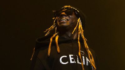 Lil Wayne, LSU’s Johnson Tease Forthcoming Music Collaboration