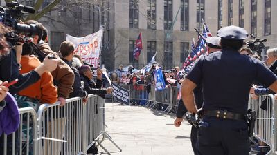 Donald Trump supporters and detractors gather outside Manhattan court and are kept apart