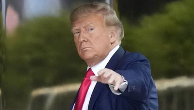 Donald Trump surrenders to NY authorities ahead of arraignment