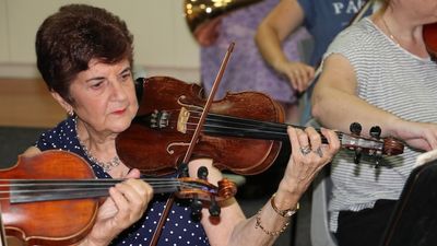 Experts say playing music is a mental workout, and the Brisbane City Pops Orchestra is living proof it pays off