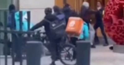 Violent brawl erupts as gang 'tries to steal Deliveroo rider's bike' in Canary Wharf