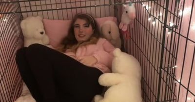 'Cruel trolls call me weird for unwinding in a dog cage - but it soothes me'