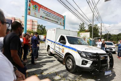 Man kills four children with hatchet after climbing over wall in nursery in Brazil