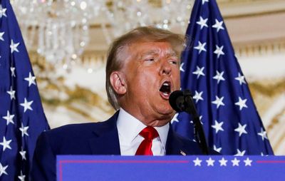 Trump, newly charged, urges defunding US Justice Department and FBI