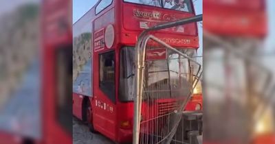 Kids board Liverpool sightseeing bus and crash it into metal fence