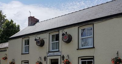 A historic Gower pub has reopened for the first time in three years