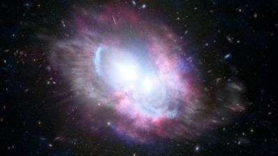 2 merging supermassive black holes spotted at 'cosmic noon' in early universe